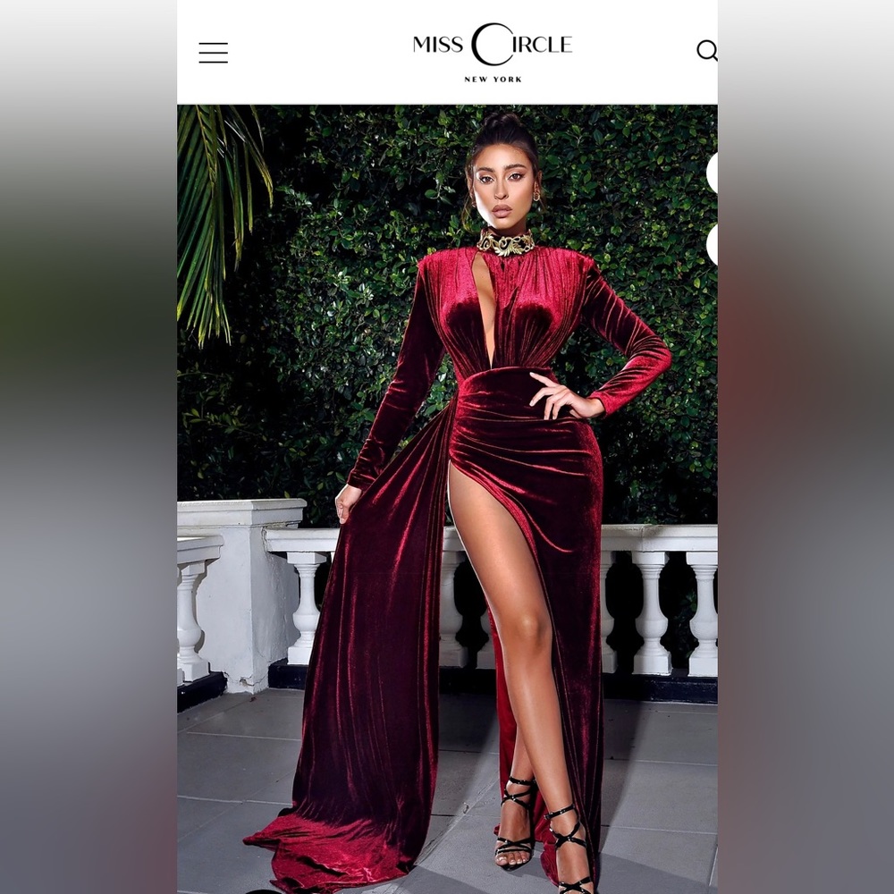 Burgundy velvet dress with gold details.